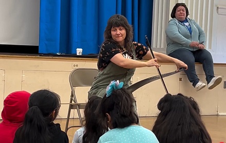 Becky Poole playing the saw at Alta Loma Elementary